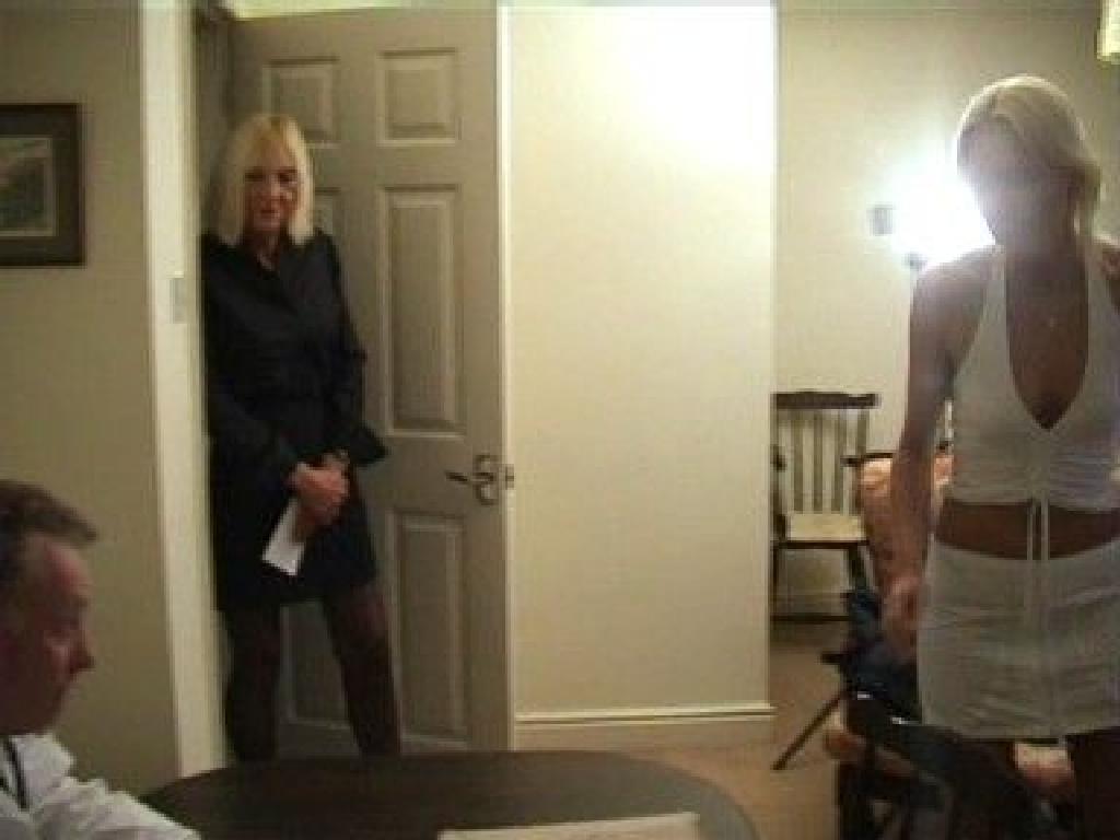 Mature grandma Kay lying naked on the examination table with legs spread for the doctor